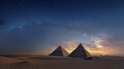 Majestic pyramids under the starry milky way sky