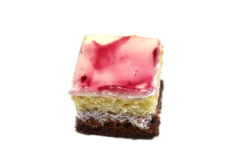 Blue berry topping on a small gateau cake, Gateau bites are small bite-sized portions of cake, made of various cake flavors and fillings, miniature cakes, Eclairs, mille feuille and sponge cake