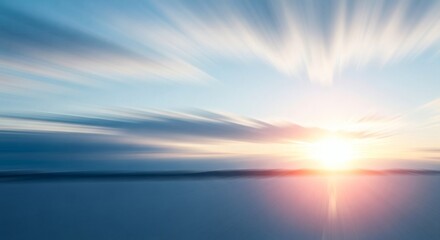 Sunrise over a calm body of water with motion blur