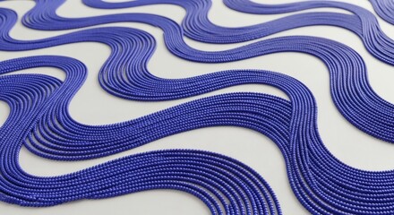 Wavy strands of blue beads create an abstract pattern