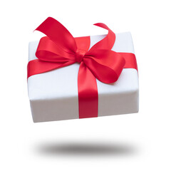 Dynamic angle white gift box with red ribbon bow floating on the air
