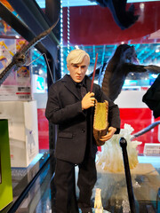 Naklejka premium Taiwan, Taipei City – July 18, 2022: Draco Malfoy figure model displayed and sold inside Syntrend Creative Park. He is an important character in the Harry Potter movie series.