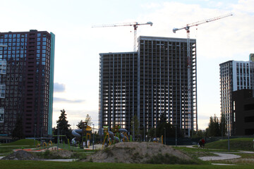 construction site with crane, building under construction