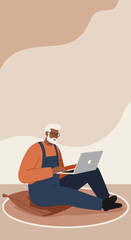Happy senior man with white beard and glasses sitting on a cushion, using a laptop. Modern aging, digital literacy, and online connection concept.