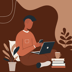 A young person comfortably works or studies from home, cross-legged with a laptop and smartphone. Represents remote work, online learning, and modern digital lifestyle.