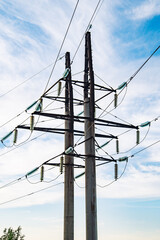Power lines supplying electricity in Crimea under cloudy sky
