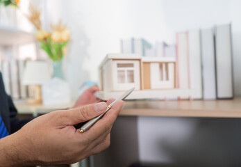 Model Home Overview. Real estate agent discussing features with client.