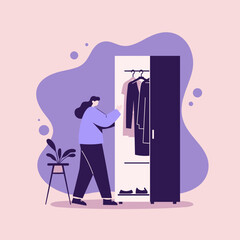 Woman organizes or chooses clothes from her wardrobe at home. Illustrates daily routine, personal style, fashion, and home organization concepts.