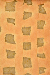 A close-up, full-frame image captures the golden-brown lattice top of a freshly baked apple pie,...