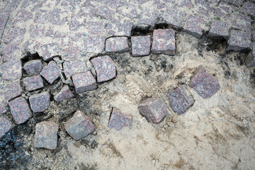 broken and damaged of granite paving blocks pattern