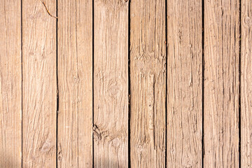 Fototapeta premium Oiled wood, showing its natural resilience with golden tones that change with the light
