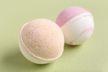 Bath bombs on green background