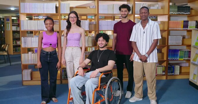 Indian asian happy young adult gen z diverse student group standing proud fold hand look camera indoor library smiling girl boy man team mate cross arm staring cam do casual pose together enjoy day