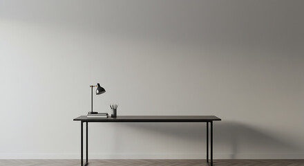 Minimalist black desk with a lamp and office supplies against a plain white wall, creating a clean and modern workspace for study or work.