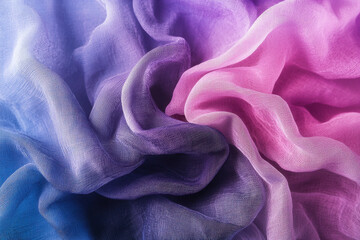 Soft, flowing fabric in beautiful gradient from deep purple to soft pink, creating serene and calming atmosphere. delicate texture adds depth and elegance to composition