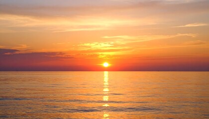 Obraz premium Sunset over tranquil ocean