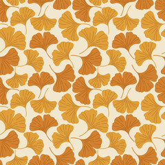 Seamless pattern with golden ginkgo leaves. Decorative autumn foliage background in warm orange and yellow tones. Perfect for fabric, wrapping paper, wallpaper and seasonal design.
