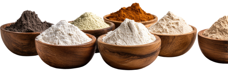Assorted powdered ingredients in wooden bowls