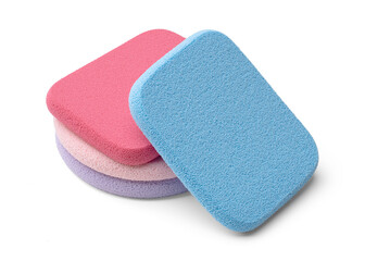 Bright makeup sponges on a white background. Makeup products. Makeup application tools.