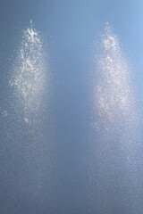 Splash of water on blue sky backgournd