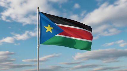 South Sudan's vibrant flag waving high with pride against a serene sky, symbolizing independence and national identity on bright day