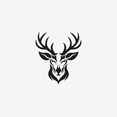 Fototapeta premium Black Stylized Deer Head with Intricate Antlers and Tribal Design stag buck