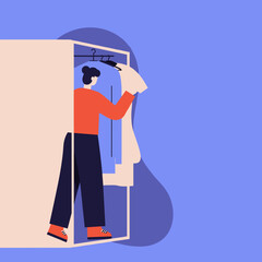 Person selecting an outfit from a neat wardrobe, representing daily preparation, home organization, and fashion choices for lifestyle content.