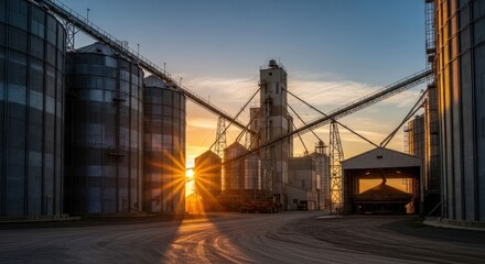 Grain silos at sunset