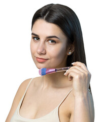 Close-up of a young girl in a light top on a white background making a facial make-up. A pretty woman holds a cosmetic brush near her face and smiles.
