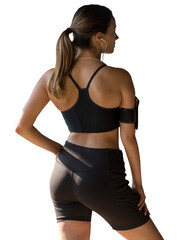 A young slim athletic girl in sportswear performs a set of exercises. Fitness and healthy lifestyle.