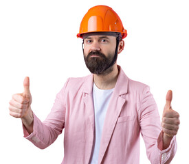 Portrait of young construction engineer wear orange hard hat, in a pink jacket standing on red studio background. The man points with his hand.