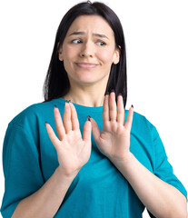 Portrait of uncomfortable pretty brunette, raising palms in stop gesture. That is enough, thanks.