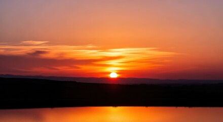 Obraz premium Sunset over water, vibrant colors