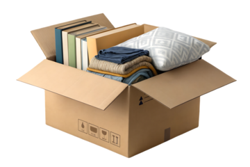 Open cardboard box containing books, clothing, pillow and household items ready for moving, isolated on a transparent background