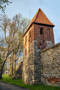 Stone bastion and medieval defensive walls in Osno