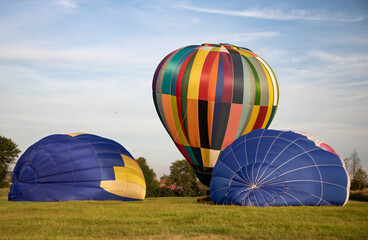 Hot air balloons on the window preparing for flight