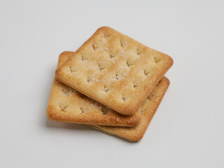 Crispy crackers on white background