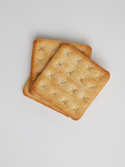Crispy crackers on white background