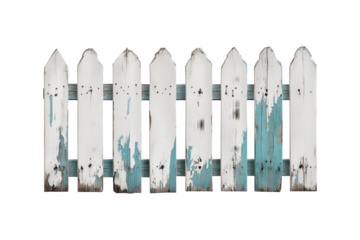 White picket fence with a rustic, vintage appearance and pointed tops