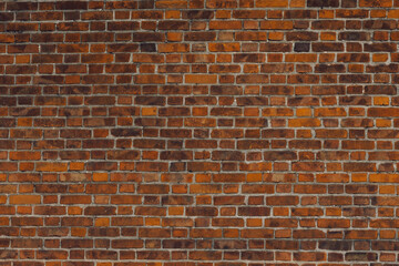 The texture of the red brick wall background. Clinker brick. A brick background wall. Grunge, a...