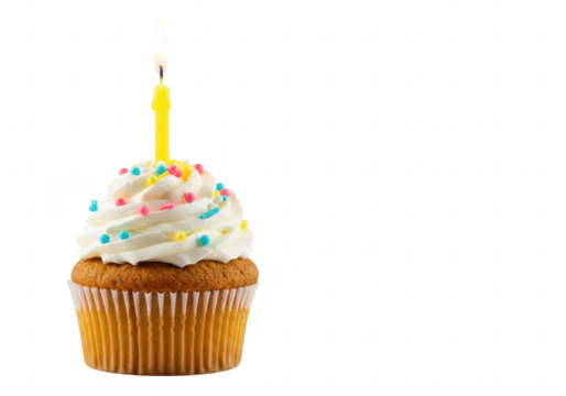 A single cupcake with white frosting and colorful sprinkles, topped with a lit yellow candle, isolated on transparent background