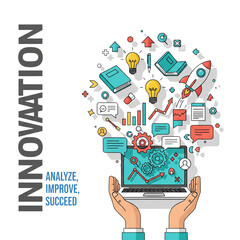 Hands holding laptop with innovation concepts exploding outwards