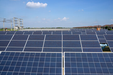 Solar panels generate electricity at solar farm.