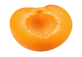 A fresh, ripe apricot cut in half, revealing its juicy texture and pit, isolated on transparent background
