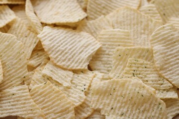 Homemade Flavored Paprika Potato Chips in a Bowl, top view. Flat lay