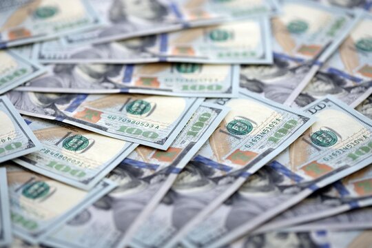 Lots of american dollar bills in big stack. United states money banknotes