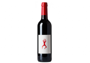 A sleek, dark glass bottle of red wine, featuring a minimalist red abstract figure on its label, isolated on a clean transparent background
