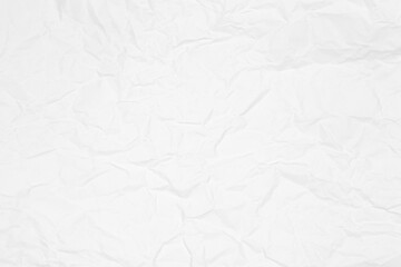 White crumpled paper texture background, wrinkled creased abstract pattern. Use for design, wallpaper, and backdrop.