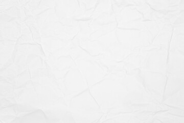 Abstract white crumpled paper background. Wrinkled sheet with rough surface texture pattern for wallpaper.