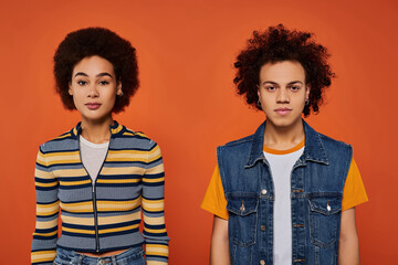 Celebrating unique styles with young individuals showcasing curly hair and vibrant outfits